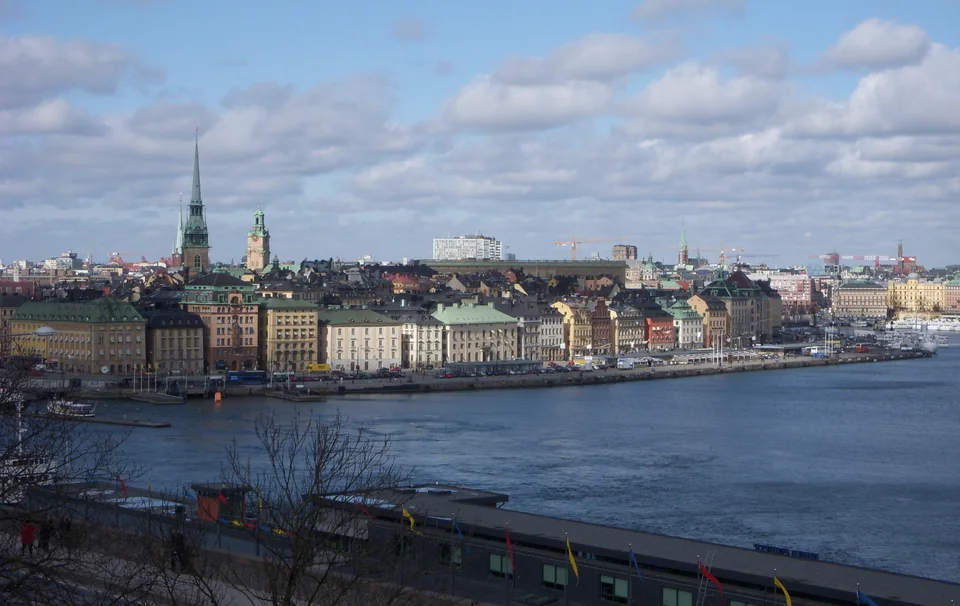 Panorama of the old town with spires on an island across wide water